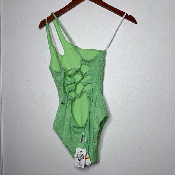 BECCA By Rebecca Virtue Glimmer
Asymmetrical One-Piece Swimsuit Size Small - Picture 6 of 8